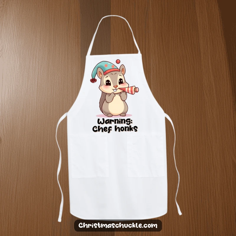 Funny apron featuring a cute squirrel character in a festive hat, honking a tiny clown horn, for playful cooking.