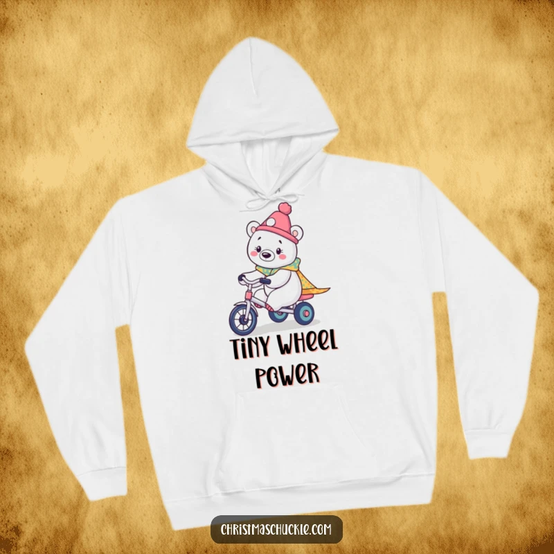 Funny hoodie with a kawaii polar bear in clown attire, humorously riding a small tricycle, designed for maximum cuteness and comfort.