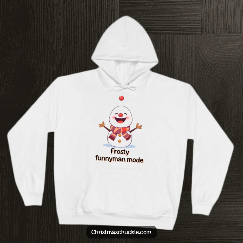 Funny snowman hoodie, a clown-smiling snowman struggling to juggle snowflakes, a humorous winter apparel gift.