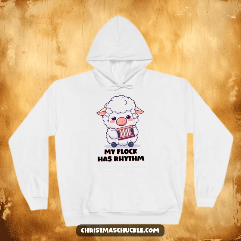 Funny hoodie featuring a fluffy sheep in a clown nose, joyfully playing a concertina, ideal for music lovers seeking comfort and humor.