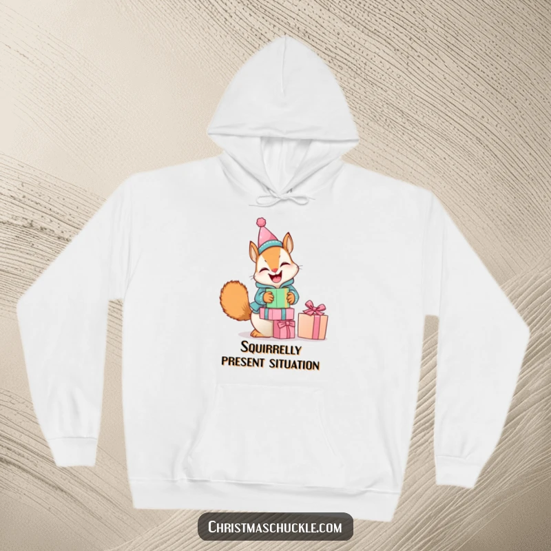 Funny hoodie graphic of a giggling squirrel in a tiny clown suit, humorously balancing a stack of presents, perfect for cozy laughs.