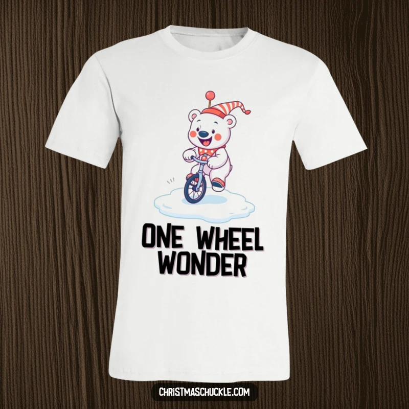 Funny jolly polar bear clown trying to balance on a unicycle on a slick ice patch, humorous t-shirt for winter fun.