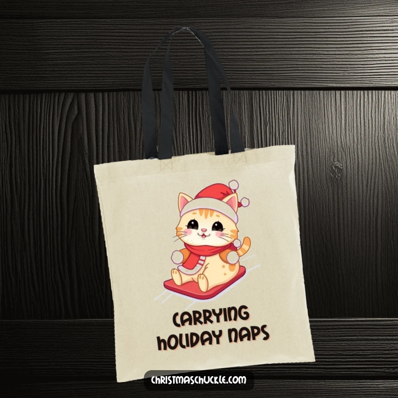 Funny Kawaii Santa Cat Tote Bag: A cute cat in a Santa outfit, happily sliding down a snowy hill, ideal for shopping.